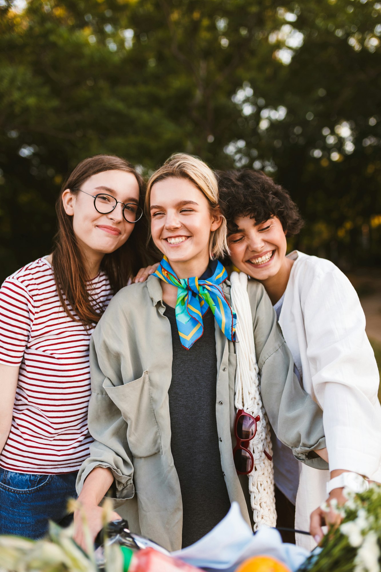 Portrait of beautiful smiling girls with bicycle happily spendin