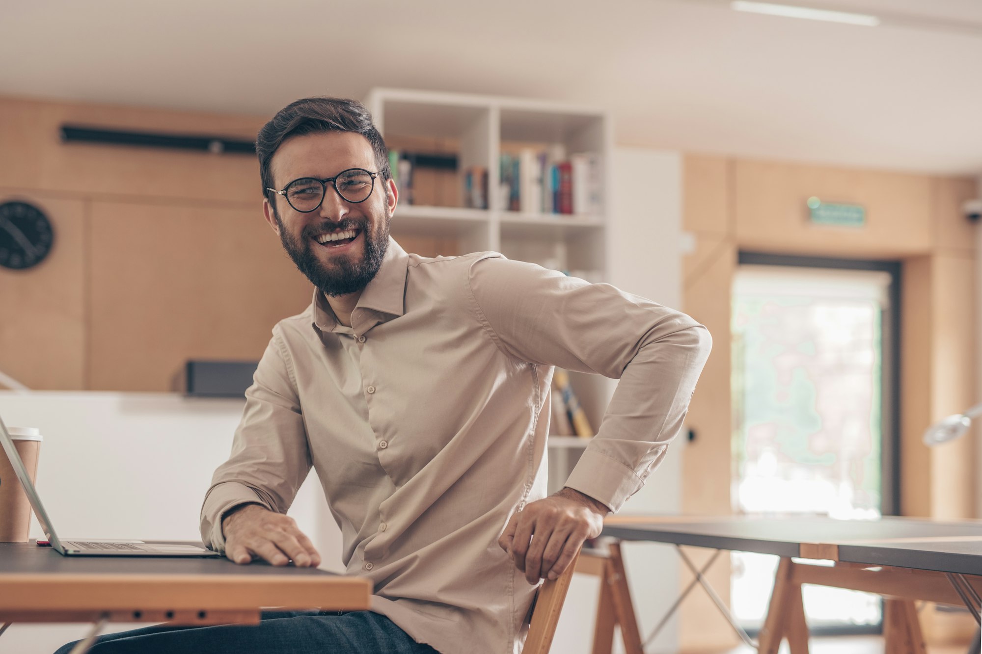 Smiling man in coworking